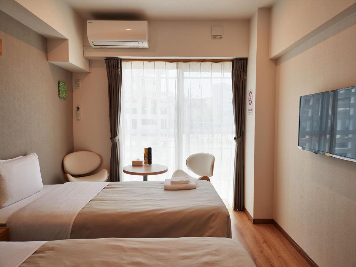 アルセ琉球ハーバーステイ Aparthotel Urasoe Екстериор снимка